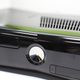 Illustration for article titled The New Xbox 360 in Person: So Glossy It Hurts